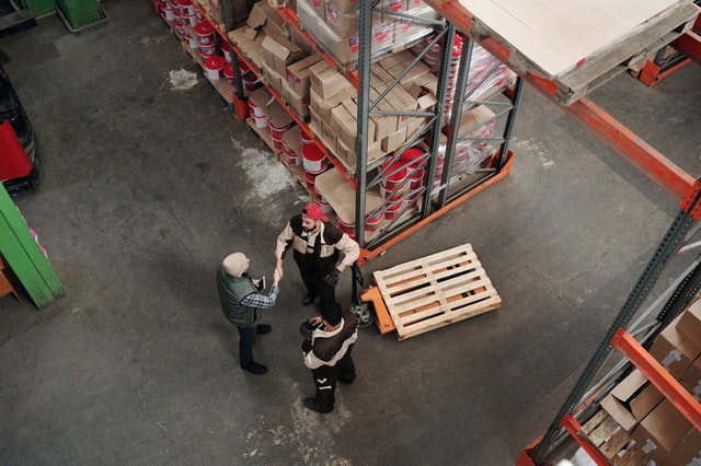 warehouse crew discussing plans