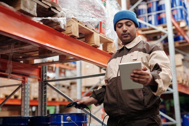 man scanning inventory
